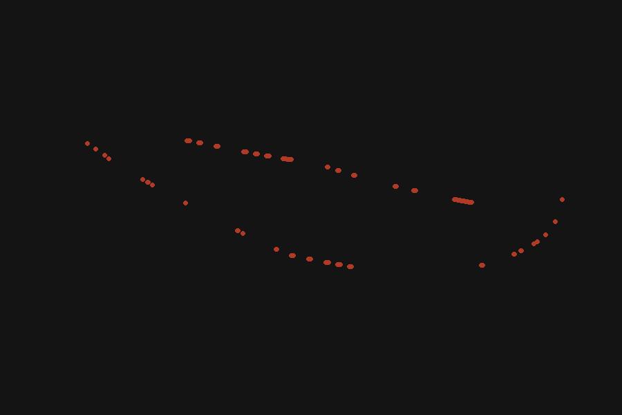 A single broad mark, with short red dashes along two long shallow curves through it.